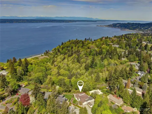 Views looking out toward Puget Sound and the Olympic Mountains are visible from this stunning home with western exposure -- perfect for enjoying sunsets.