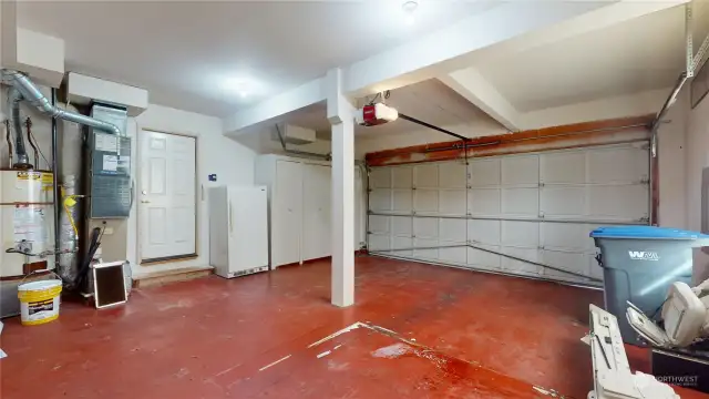 The large garage has plenty of storage and an additional refrigerator for surplus food and drink!