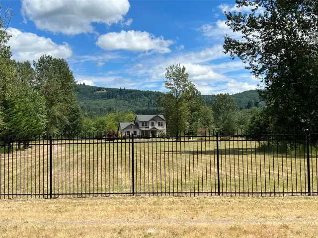 Property fenced on three sides. Open facing river bank only.