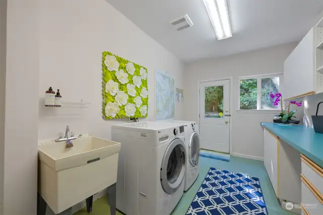Laundry room with door to side courtyard