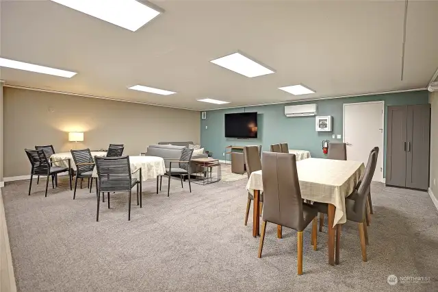 Community room with kitchen and TV. Also available for private paeries