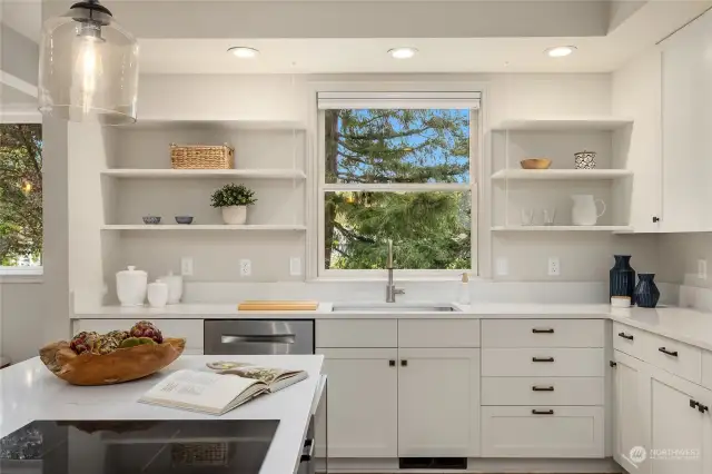 Just a bit of open shelving complements the custom, soft-close cabinetry