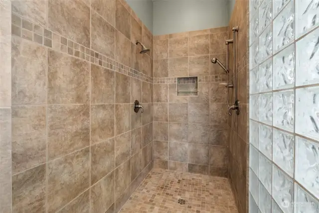 Tile shower in main bath, heated floors