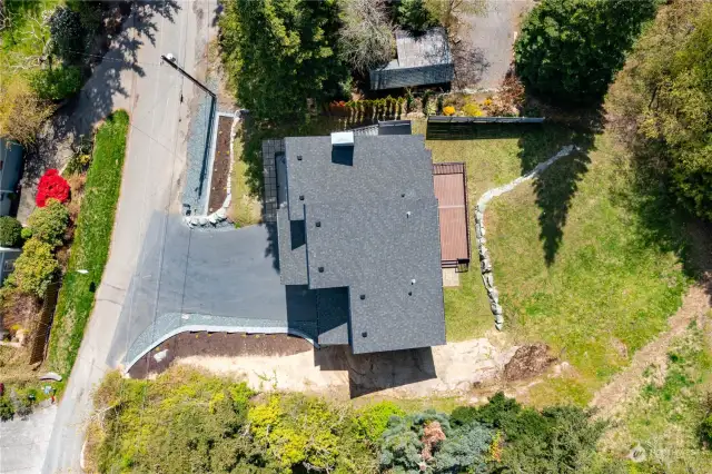 Aerial view of the property. Extra parking on the street in front of the house for guests.