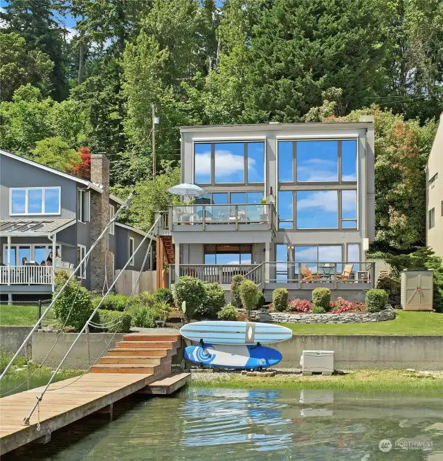 Crisp clean lines and modern architecture with soaring ceilings and emphasis in drinking in dreamy lake views. Well maintained dock with boat lift and great lakefront storage for stand up paddle boards and kayaks.