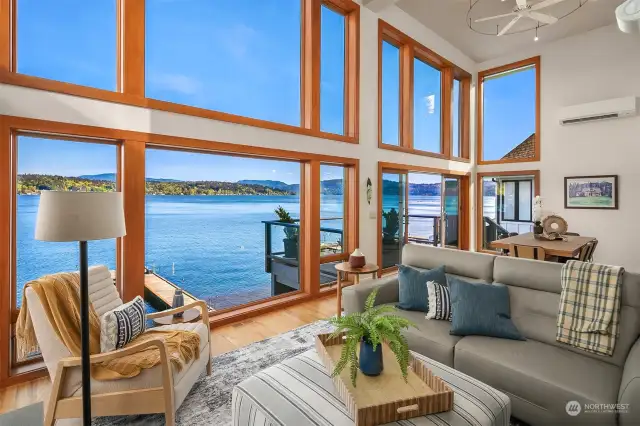 The main living room sports floor to ceiling windows with Lake Sammamish proudly positioned at center stage.  Remote controlled automatic shades which are see through.