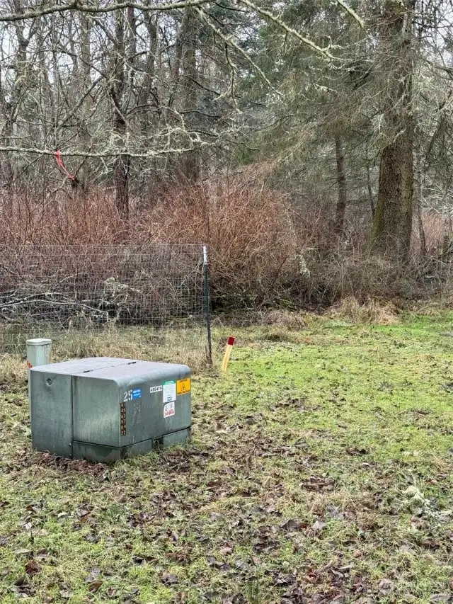 Electrical transformer located approximately 300' South of the Northeast corner of the property.