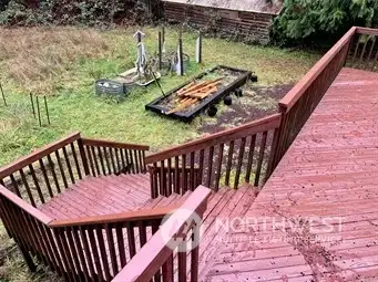 Picture of Stairs from deck descending to backyard