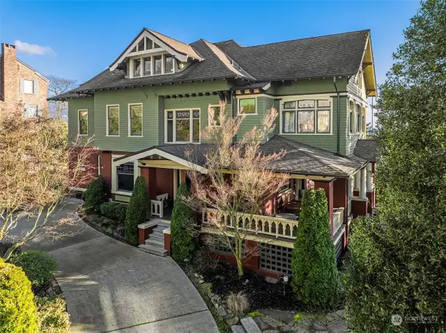 Timeless Style & Endless Views in 1906 Queen Anne Craftsman extensively preserved and restored.