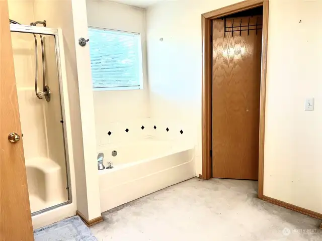 Tub and Shower and Closet-Primary