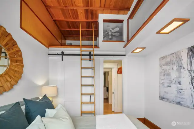 Loft in bedroom for extra storage space.