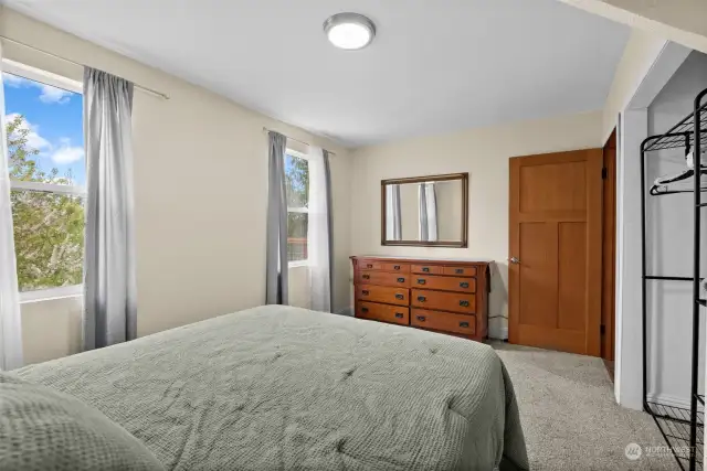 Perfect sized bedroom on the main. Could make this the primary if you don't want to walk upstairs.