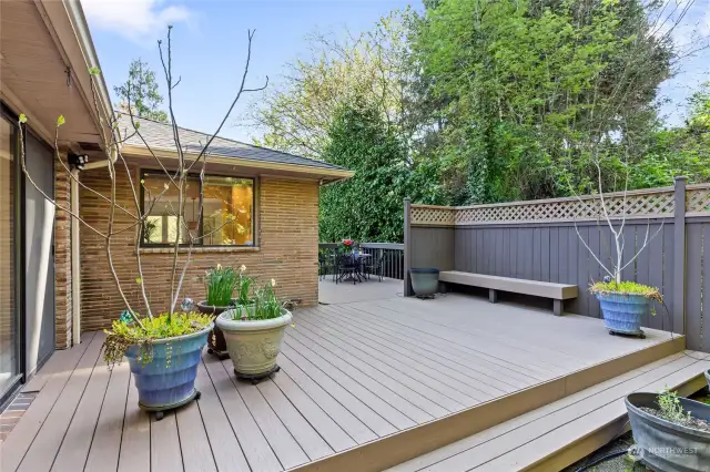Private back low maintenance deck area has loads of possibilities. BBQ gas hook-up also!