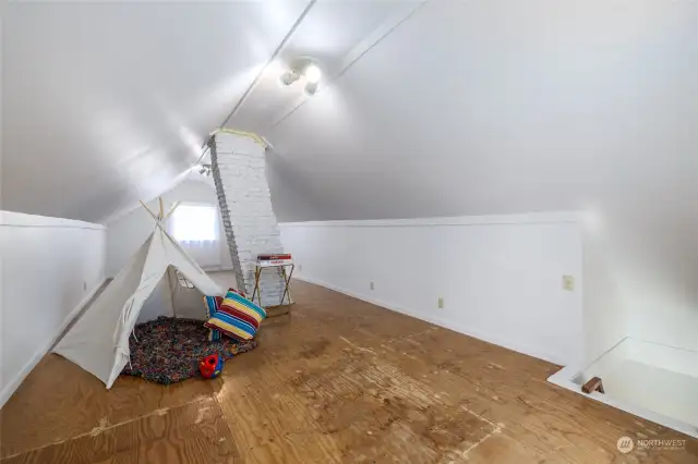 The attic space which is very large could be used for so many things but currently used as a playroom.