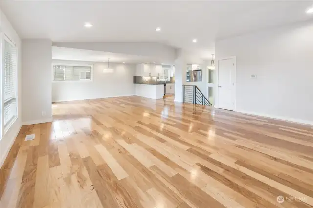 Hardwood floors throughout living room, dining room and kitchen.