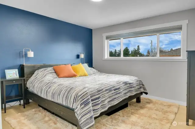 Primary Bedroom.  Light Filled Room, Accent Walls, Large Closets.
