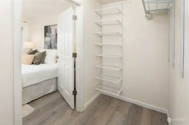 Another view of the bedroom closet and shelving system