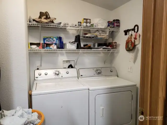 Utility Room with Storage Shelves.