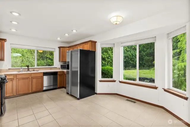 The large kitchen welcomes you with a pantry to your left, dining room to your right.