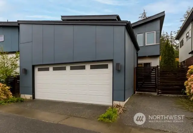 A 2-car garage can be a great addition to any home. Having an insulated garage can help regulate temperature and reduce noise, making it a more comfortable and functional space.