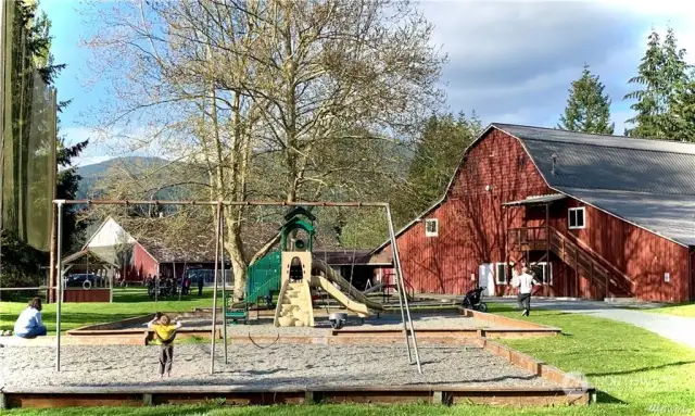 Community Center "The Barn" and playground in the recreation coordior