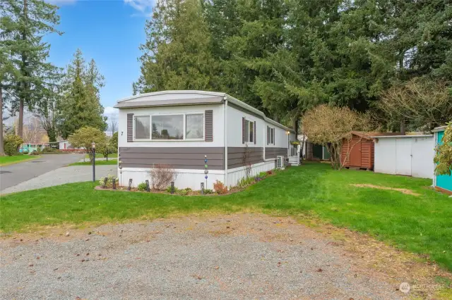 The seller enjoys beautiful side yards on both sides of the home.