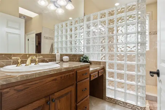 Master bath comes with double sink areas, tile floors, walk in shower.