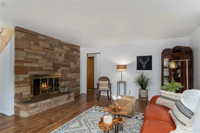 Turn right inside the front door and fine a spacious living room with fireplace