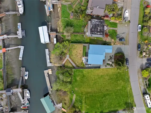 Aerial view of home (blue metal roof) - street to dock!