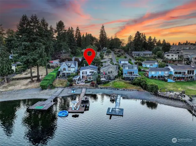 Excellent Location and Private Setting.  The skies light up from sunrise to sunset on this lake front home.