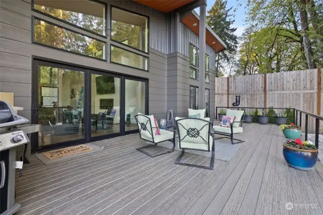 Oversized deck with multiple seating areas.