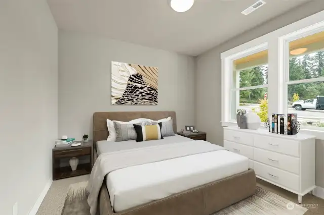 the guest bedroom easily holds a queen bed plus nightstands or dressers.