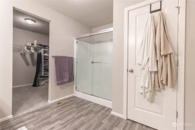 Primary bath with shower and large walk-in closet