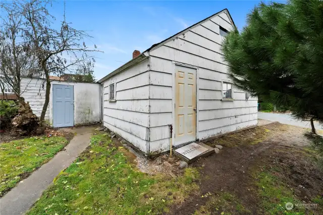 Garage with little attached storage shed. Potential to convert to an ADU.