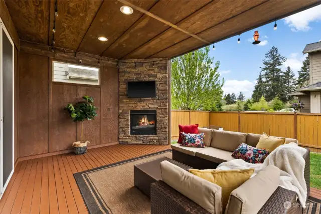 This is indoor/outdoor living at its best! Completely covered with gas fireplace, wired for television - a perfect extension to your living room