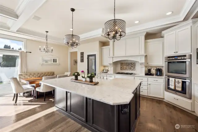 This kitchen is truly the heart & center of this home- centrally located makes entertaining here a breeze. All your guest will be able to mingle with this open concept living, kitchen, dining area.