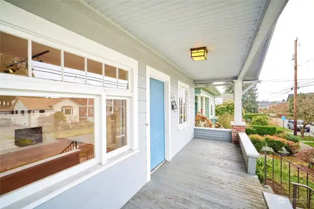The sprawling front porch is consistent with Seattle Craftsman homes in the early 1900's.