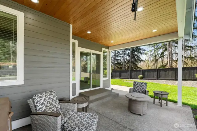 This covered patio is a great place to entertain in all weather conditions.