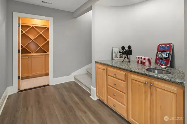 Lower level offers wet bar and ventilated wine storage cellar