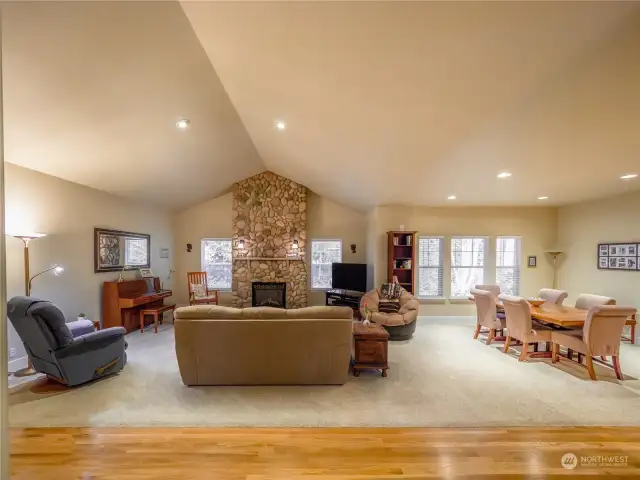 Great Room with River Rock fireplace and dining area!