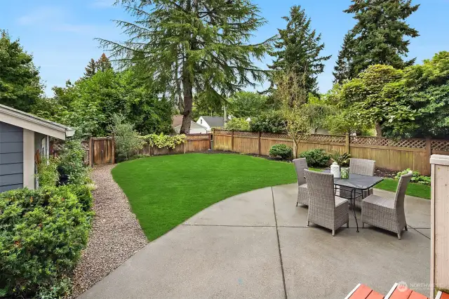 Amazing sun drenched back yard is the perfect manageable size yet still has room for all the activities!