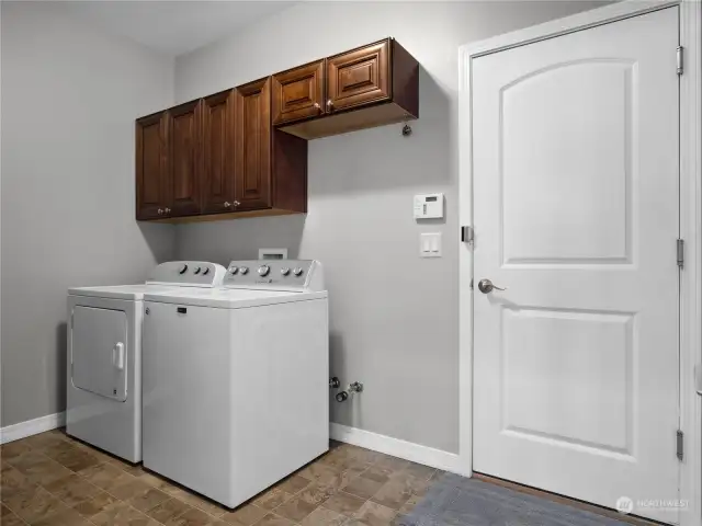 Laundry area that leads to the 3 car garage!