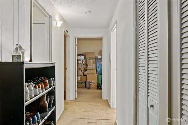 A view down the hallway, note the storage closets to the right.