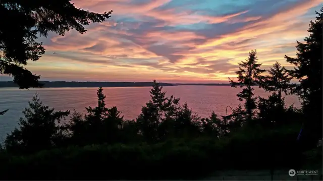 Sunset viewscape is stunning year round at 971 Rockaway Lane Camano Island.
