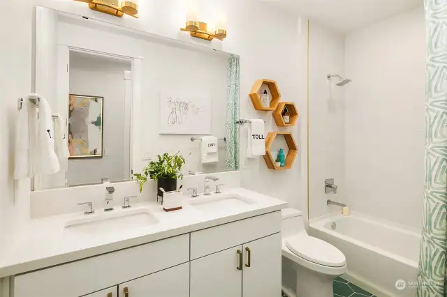 Full main hall bathroom with dual sink vanity