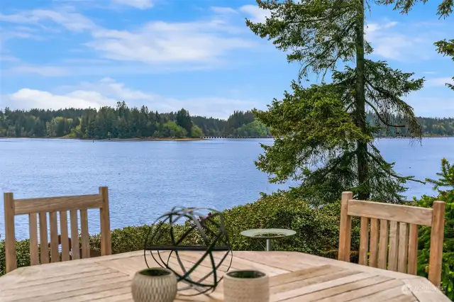 Immerse yourself in stunning 180-degree soundscapes. This waterfront oasis extends beyond the view, offering 140 feet of private waterfront for endless activities.