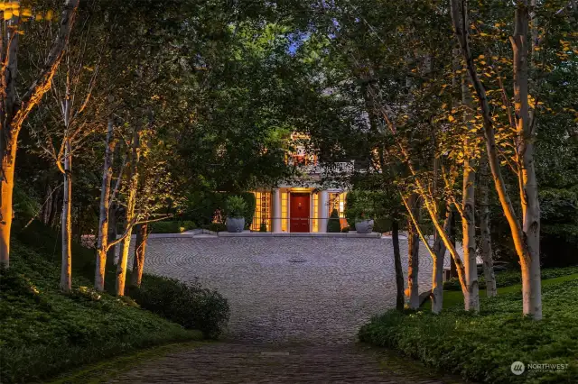 Meander through the gated entry & down the graciously framed cobbled drive to this legendary property... Long Island on Mercer Island!