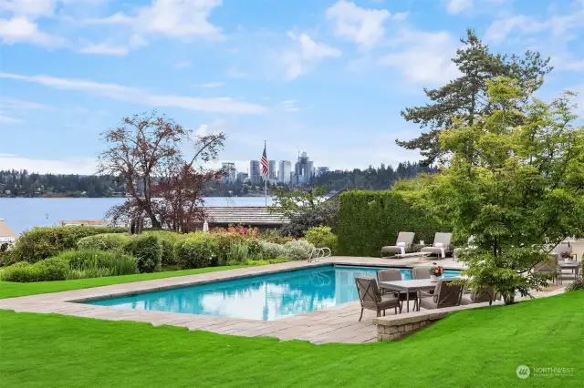 Sweeping city of Bellevue views beyond the fabulous lakeside cutting garden that features an array of colorful flowers, blueberry and raspberry bushes. Take a plunge in this fabulous 22 X 44 foot lakeside pool that includes an electronic cover and separate hot tub.