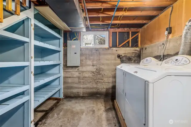 Large laundry room with great built-in shelving!