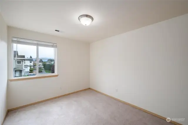 With views of the surrounding foothills, the third upstairs room would make a great office space or bedroom.